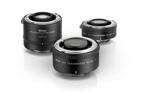 product photo of three Nikon teleconverters, 1.4x, 1.7x and 2x Nikon ...