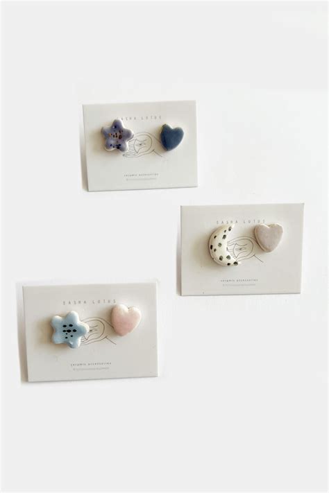 Женские серьги. Купить модные серьги для женщин от известных брендов в ...