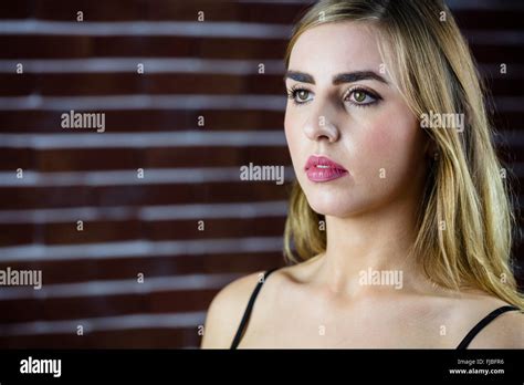 Pretty Blonde Woman Day Dreaming Stock Photo Alamy