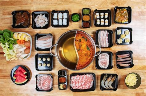 Premium Photo Set Of Shabu Shabu In Hot Pot Fresh Sliced Meat Sea Food And Vegetables