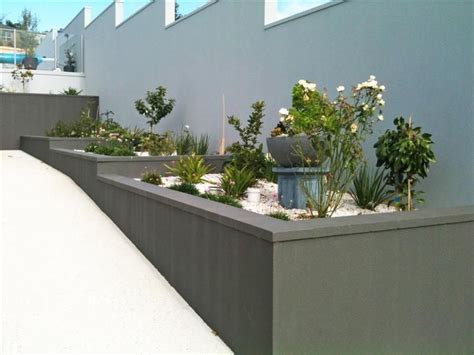 Cement rendered retaining wall Garden Wall Designs, Back Garden Design ...