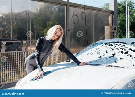 Beautiful Blonde Woman Washes Her Car At Car Wash Stock Photo Image Of Model Attractive