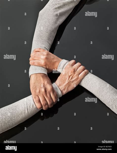 Three Hands Holding Each Other Stock Photo Alamy