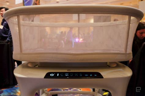 The mamaRoo sleep bassinet mimics parents' cuddles to lull babies to ...