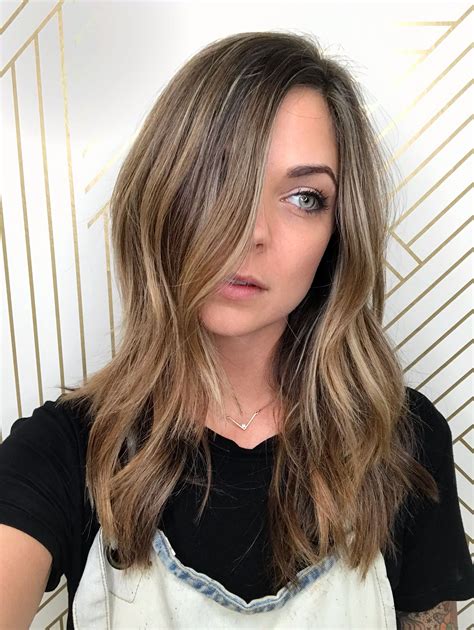 This dark brown hair with caramel babylights look suits everyone 12