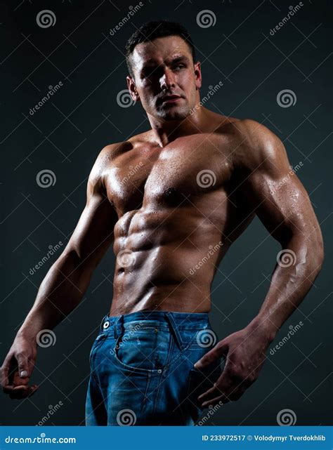 Caucasian Man In Jeans Standing With Naked Torso Guy Showing Six Pack