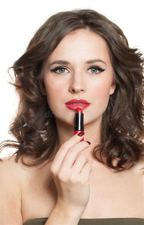 Beautiful Woman Brunette Paints Her Lips With Lipstick Closeup Beauty Portrait Stock Photo