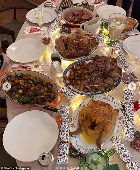 Rita Ora Shows Off Her Incredible Physique In A Tiny Blue Bikini Top In An Exotic Location