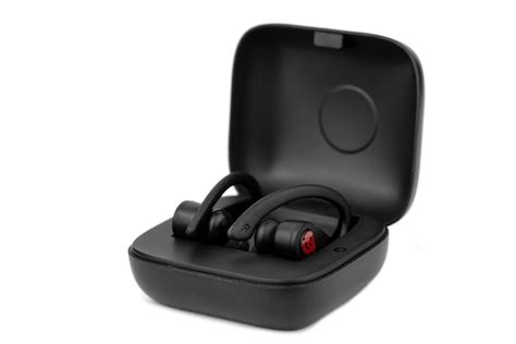 Premium Photo | The black wireless earbuds, earphone