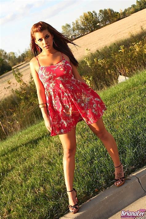 Sexy Briana Lee Lifts Her Dress To Show Us Her Pussy Photos