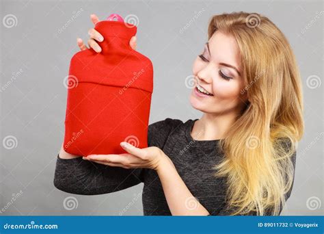 Woman Holding Warm Red Hot Water Bottle Stock Photo Image Of Holding Pain 89011732