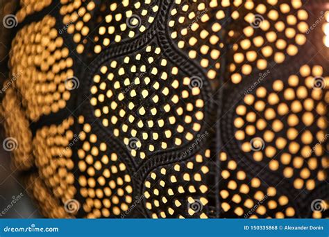 Ceiling Lamp In Dark Colors With Light Dots Texture Stock Photo