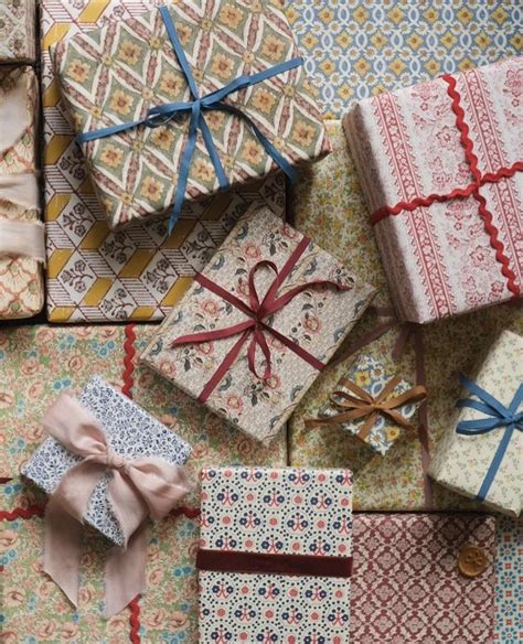 Many Different Wrapped Presents Are Laying On The Floor