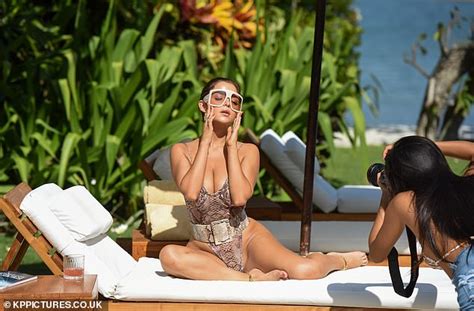 Demi Rose Oozes Sex Appeal In A Curve Hugging Snakeskin Print Swimsuit Daily Mail Online