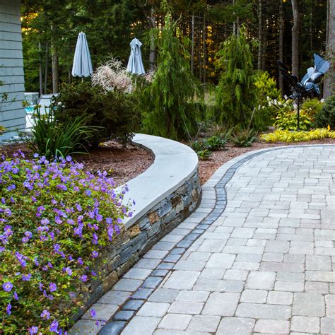 Unilock Brussels Block Paver Driveway Leading To Conifer Garden