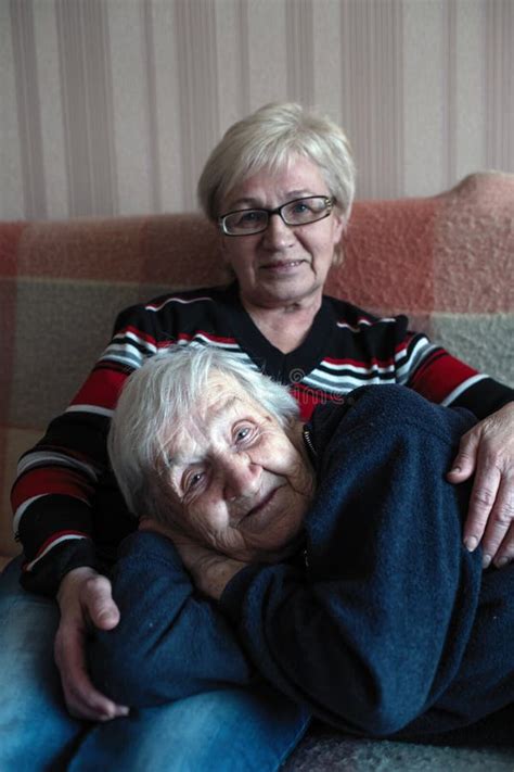 Old Woman In An Embrace With His Adult Daughter Help Stock Photo Image Of Mature Lifestyle