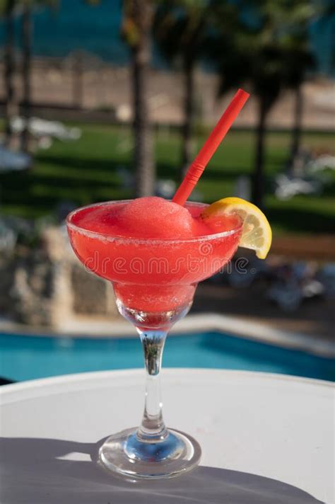 Colourful Cold Strawberry Daiquiri Cocktail Drink Served In Glass At