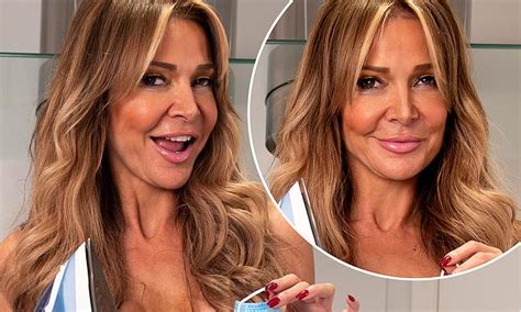 Lizzie Cundy Strips Naked To Iron Her Face Masks Daily Mail Online