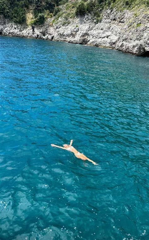 Where Is Olivia Dunne Vacationing TikTok Star Jumps Off Yacht In White Bikini In New Video MEAWW