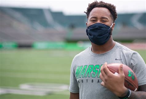 92320 Marshall Football Players Masked Up Marshallu