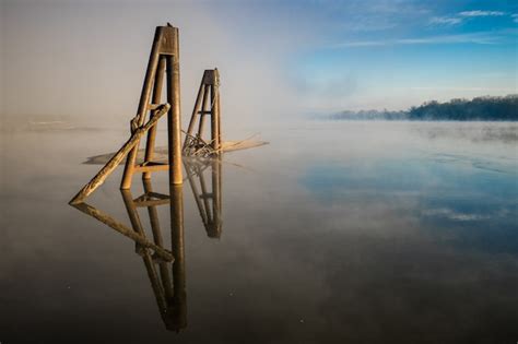 photo wooden structure   lake
