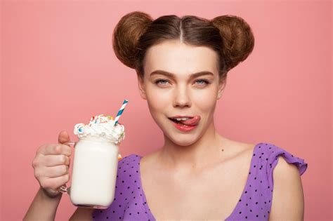 Premium Photo Brunette Girl Holding Glass Licking Lips