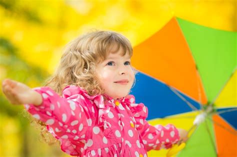premium photo happy child playing outdoors  autumn park