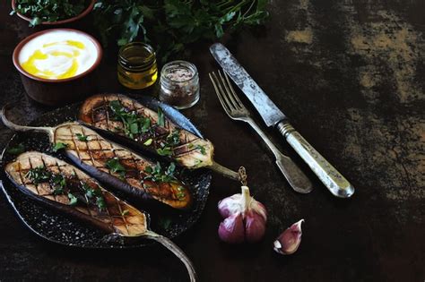 Premium Photo Baked Eggplant With Garlic And Herbs