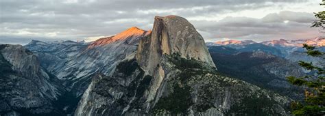 The Sun Is Setting On Half Dome Mountain In Yose Peak Yose National Park