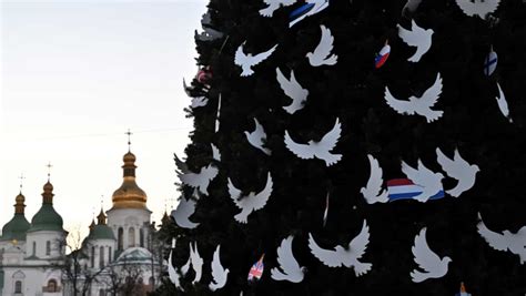 At the heart of Ukraine, a Christmas tree in a hideout - World News