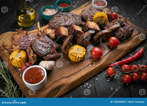 Mixed Grilled Meat Platter On A Black Background Stock Photo Image Of