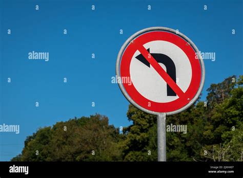 No Left Turn Sign Against Blue Sky Traffic Signs Prohibited From