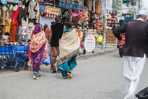 Pakistani People in Traditional Dress Walking at the Shopping Street ...