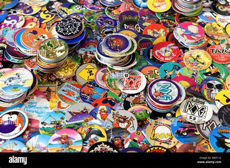 Collection of the Mid 90’s game of Pog’s Stock Photo - Alamy
