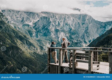 Summer Alpine Countryside Landscape With High Mountains And Farms In