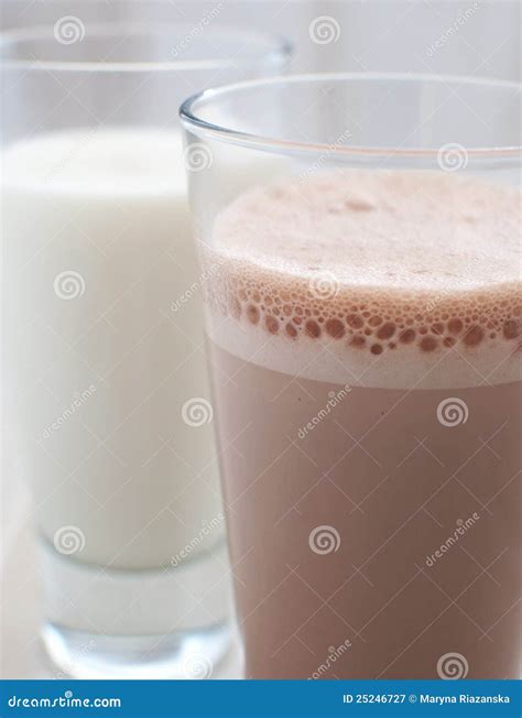 Chocolate and regular milk stock image. Image of snack - 25246727