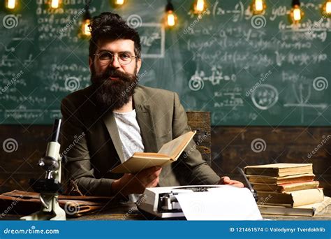 Mature Tutor Teacher Giving Private Lessons To Preschool Boy Teacher Drawing At Classroom In