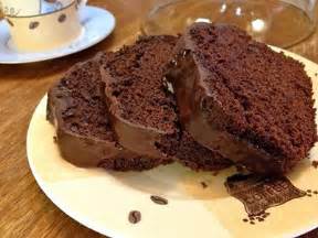 Two Slices Of Chocolate Cake On A Plate