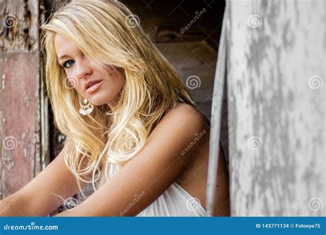 Blonde Girl Woman Dressed As Farm Country Or Cowgirl Stock Photo Image Of Seduce Blue