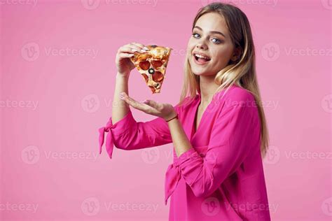 Cheerful Blonde With Pizza In Her Hands Junk Food Snack Pink Background Stock Photo At