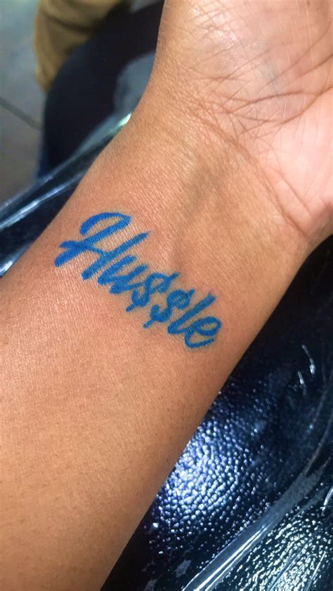 Blue Tattoo On Black Skin