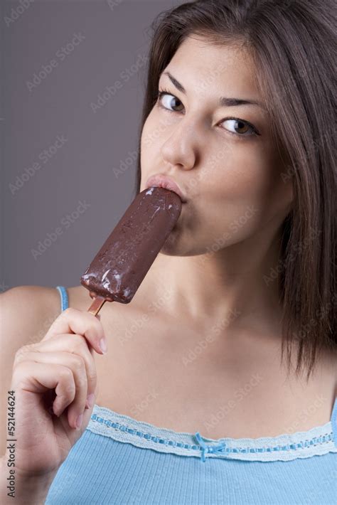 Sexy Brunette Woman Licking Chocolate Ice Cream Stock Photo Adobe Stock