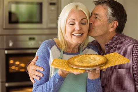 Mature Blonde Holding Fresh Pie Husband Kissing Her Stock Photos Free Royalty Free Stock