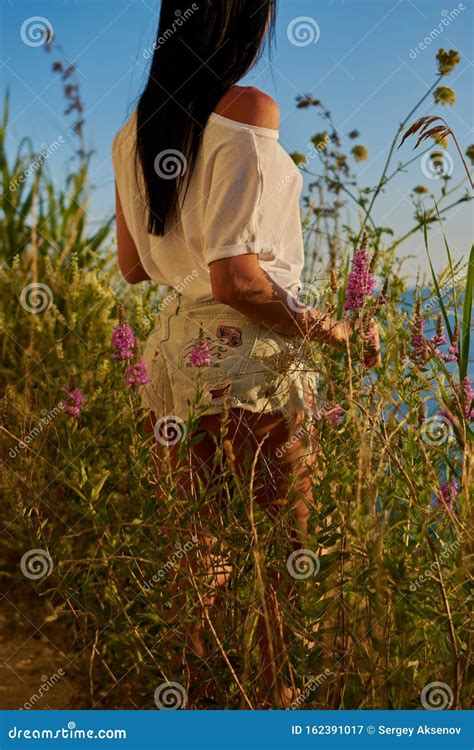 Hot Brunette Posing Near The Sea Stock Image Image Of Curvy Green