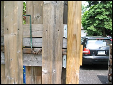 A Retracting Latch for a Gate that Swings toward the street