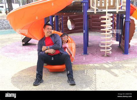 Divorced Single Dad Plays With His Brunette Latina Daughter On The Park