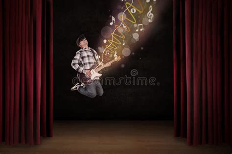 Artist Jumping with Guitar and Musical Notes Stock Image - Image of ...