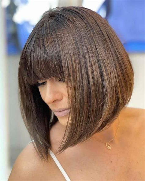 Chic Short Layered Bob With Bangs For An Eye Catching Crop