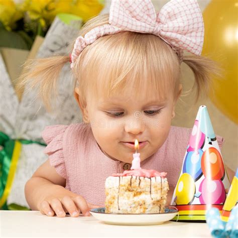 Two Year Old Blonde Girl Eating Birthday Cake On Her Birthday Stock Image Image Of Celebrate
