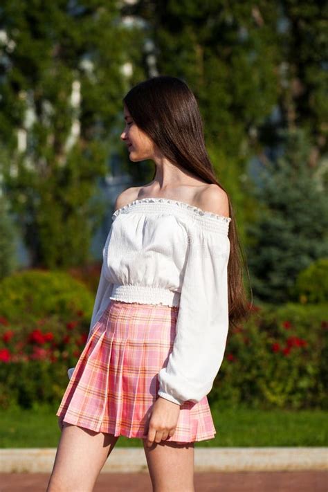 Pretty Stylish Brunette Girl In Plaid Skirt And White Blouse Stock Photo Image Of Caucasian